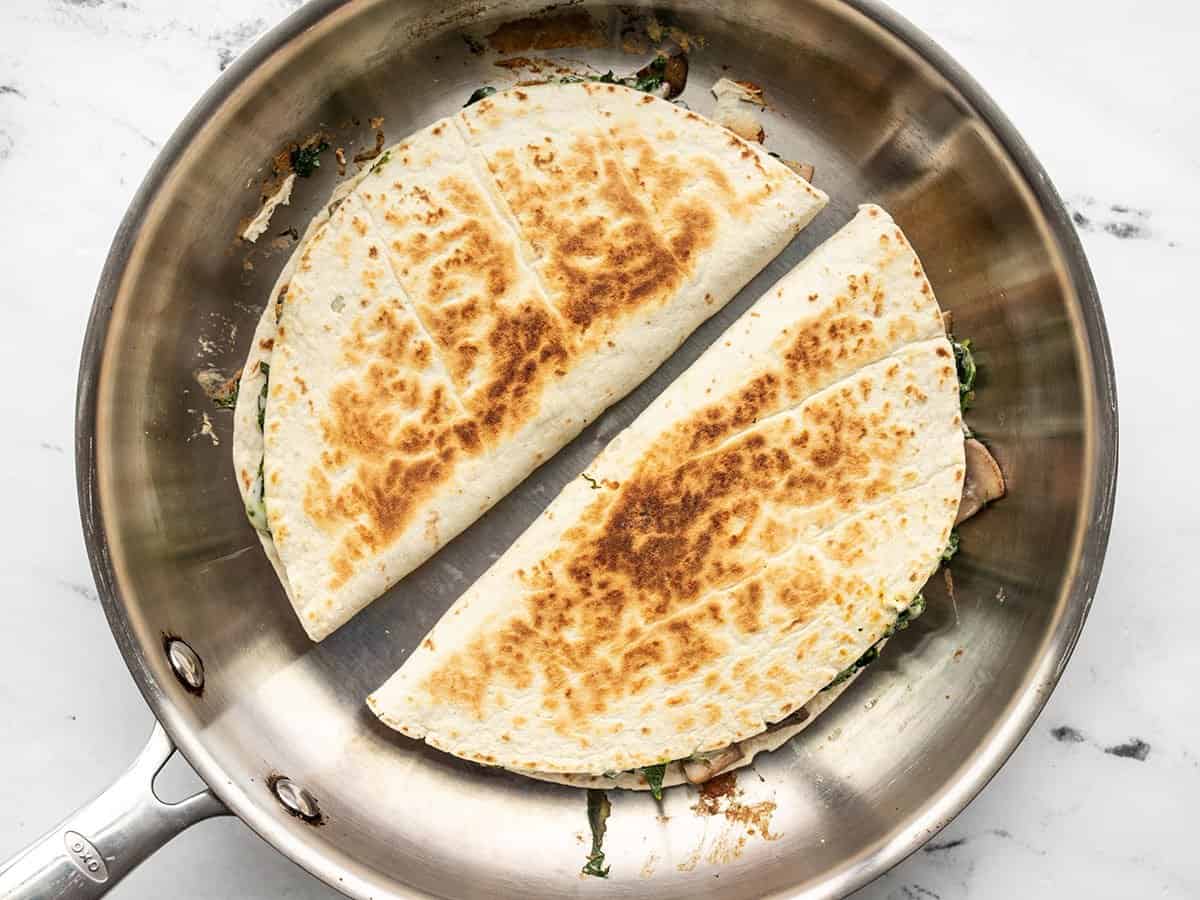 Toasted quesadillas in a skillet