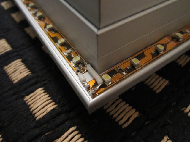 LED strips glued on to frame of IKEA HOVET mirror