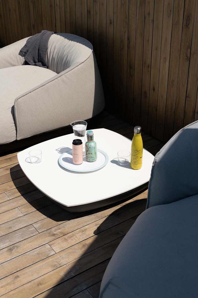 two loungers and table outdoors