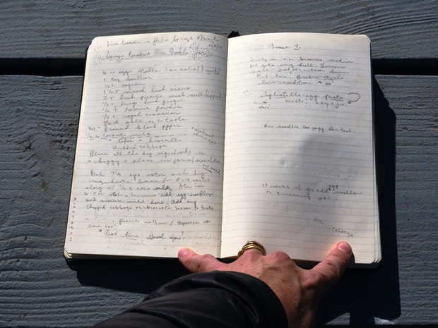 Spicy Coconut Curry Noodle Recipe Handwritten in a Notebooks