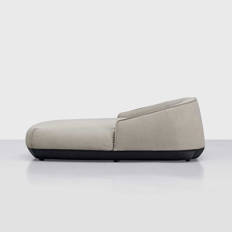 side view of outdoor lounger on grey background