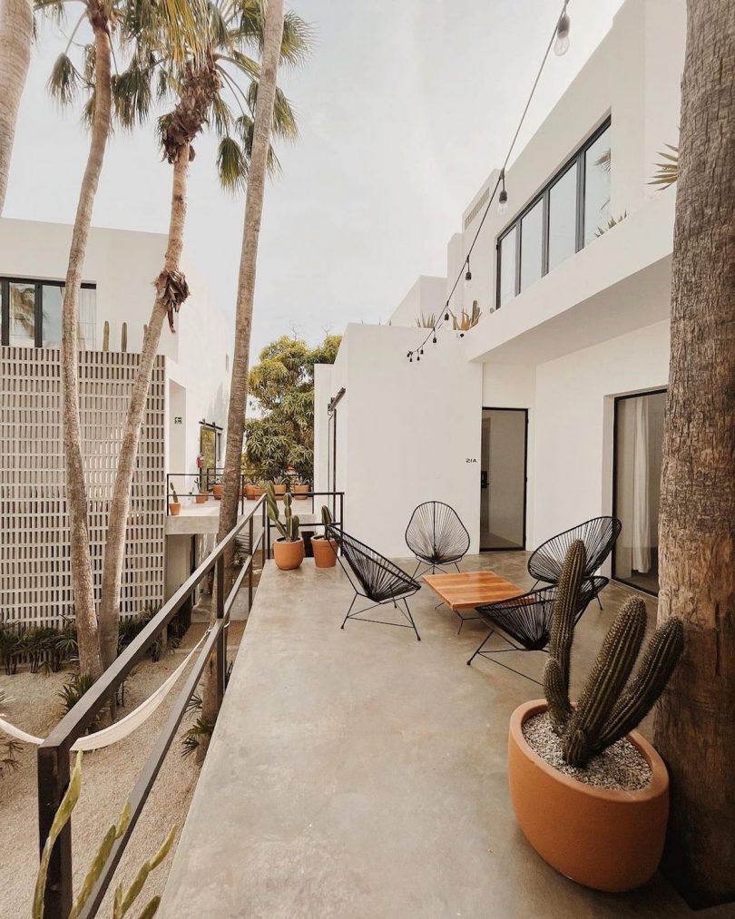 White-washed exterior facade overlooking courtyard