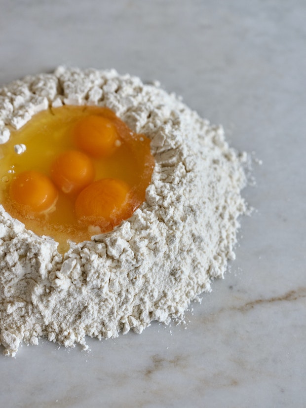 Flour and eggs ready to make pasta dough