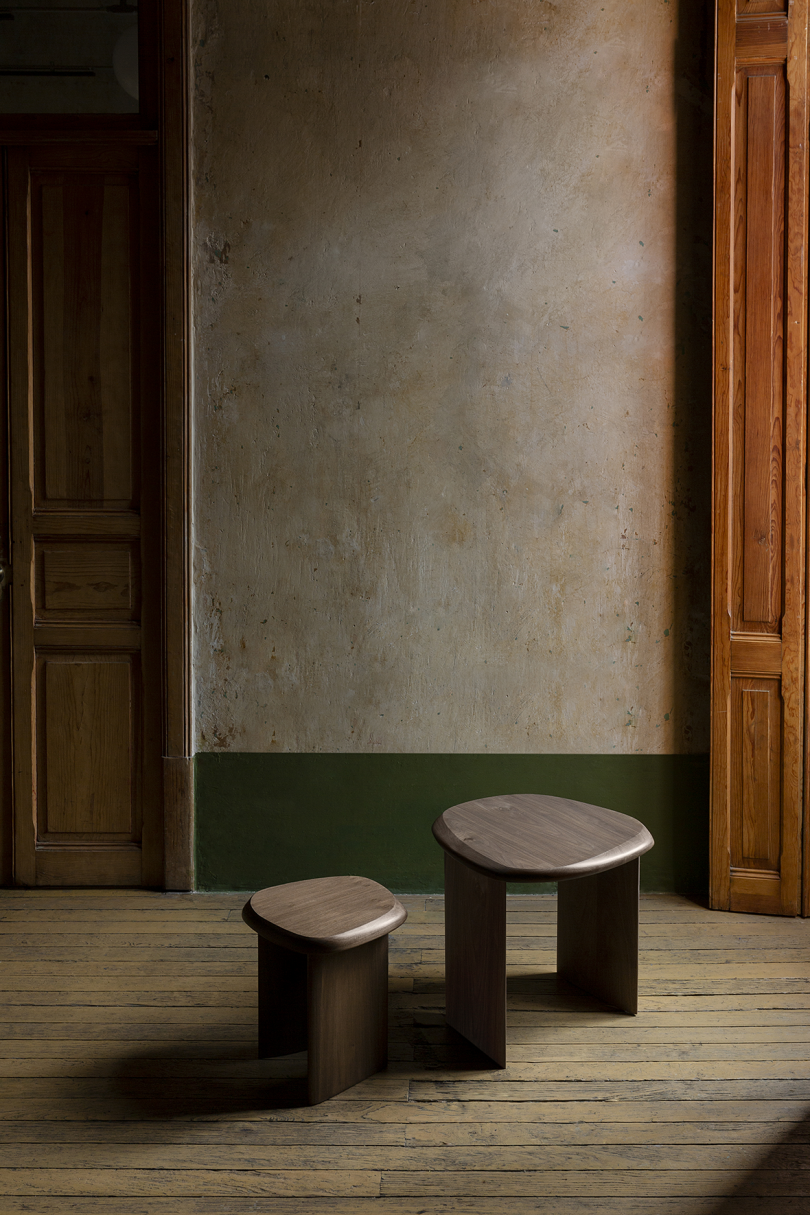 two walnut side tables