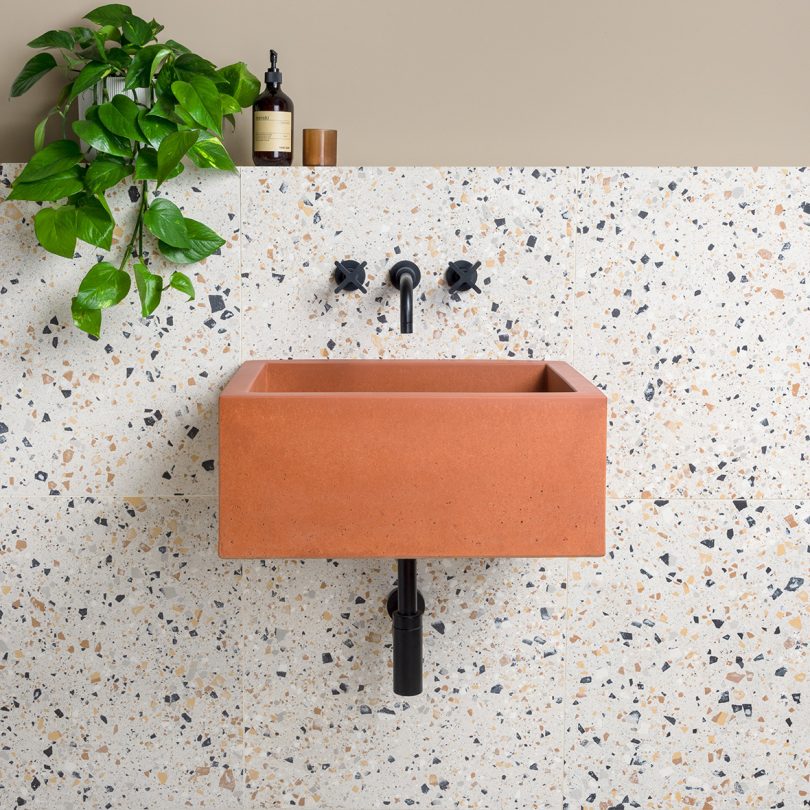 terra cotta square wall sink with wall fixtures