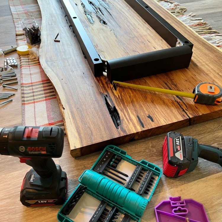 centering the IKEA table underframe on the underside of the live edge wood slab