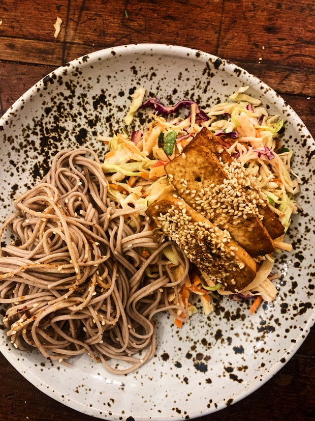 Spicy Sesame Coleslaw in A Bowl with Tofu and Noodles
