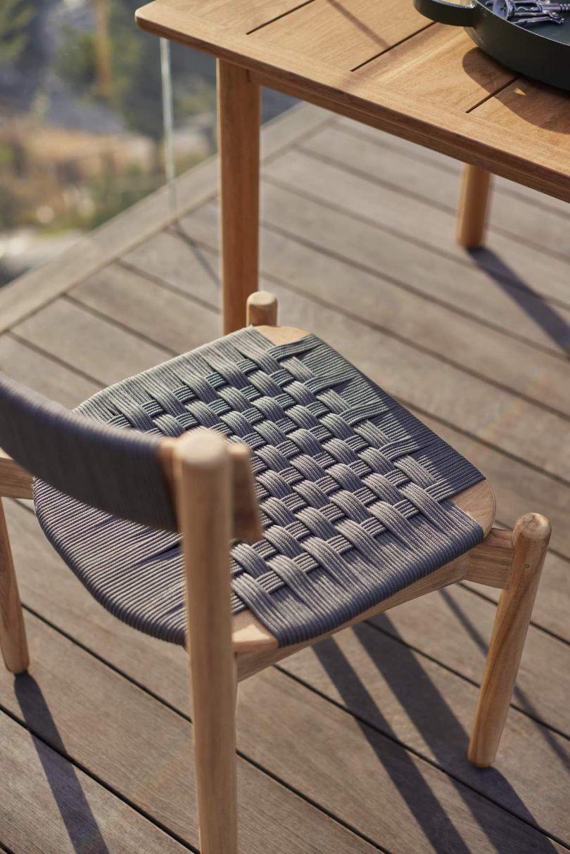 Detail shot of Koster Dining Chair, constructed of teak and acrylic rope