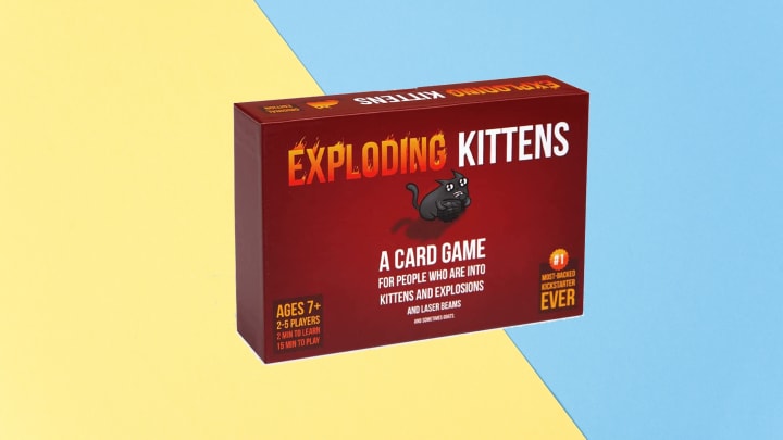 Exploding Kittens Card Game against colorful background.