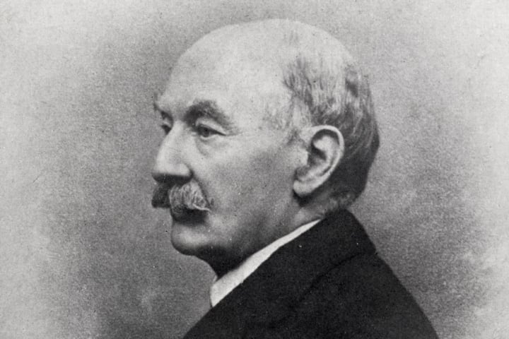A portrait of author Thomas Hardy in profile